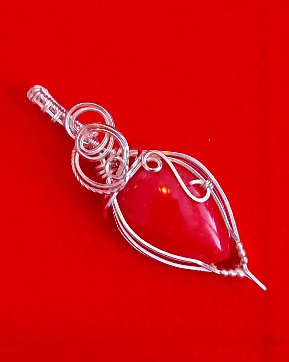 Ember, red coral pendant in silver-tone wire