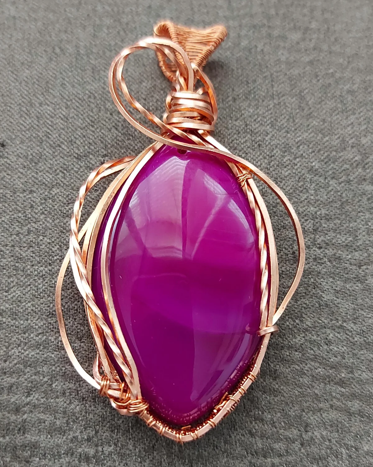 Orchid, fuchsia agate pendant in copper wire